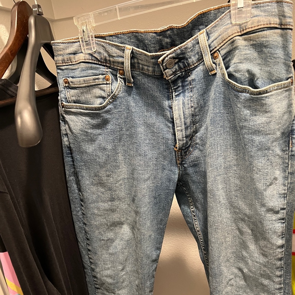 Levi’s 511 blue washed jeans. Athletic fit. 34 W.